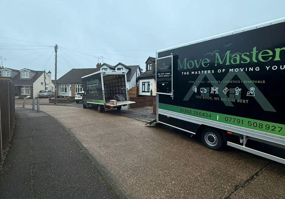 Genuine Move Masters vehicles outside homes